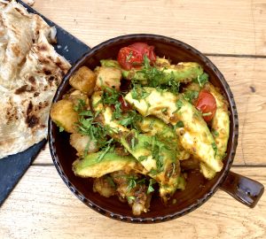 Garnished Jeera Avocado: Fresh coriander and dill add vibrant color and freshness.