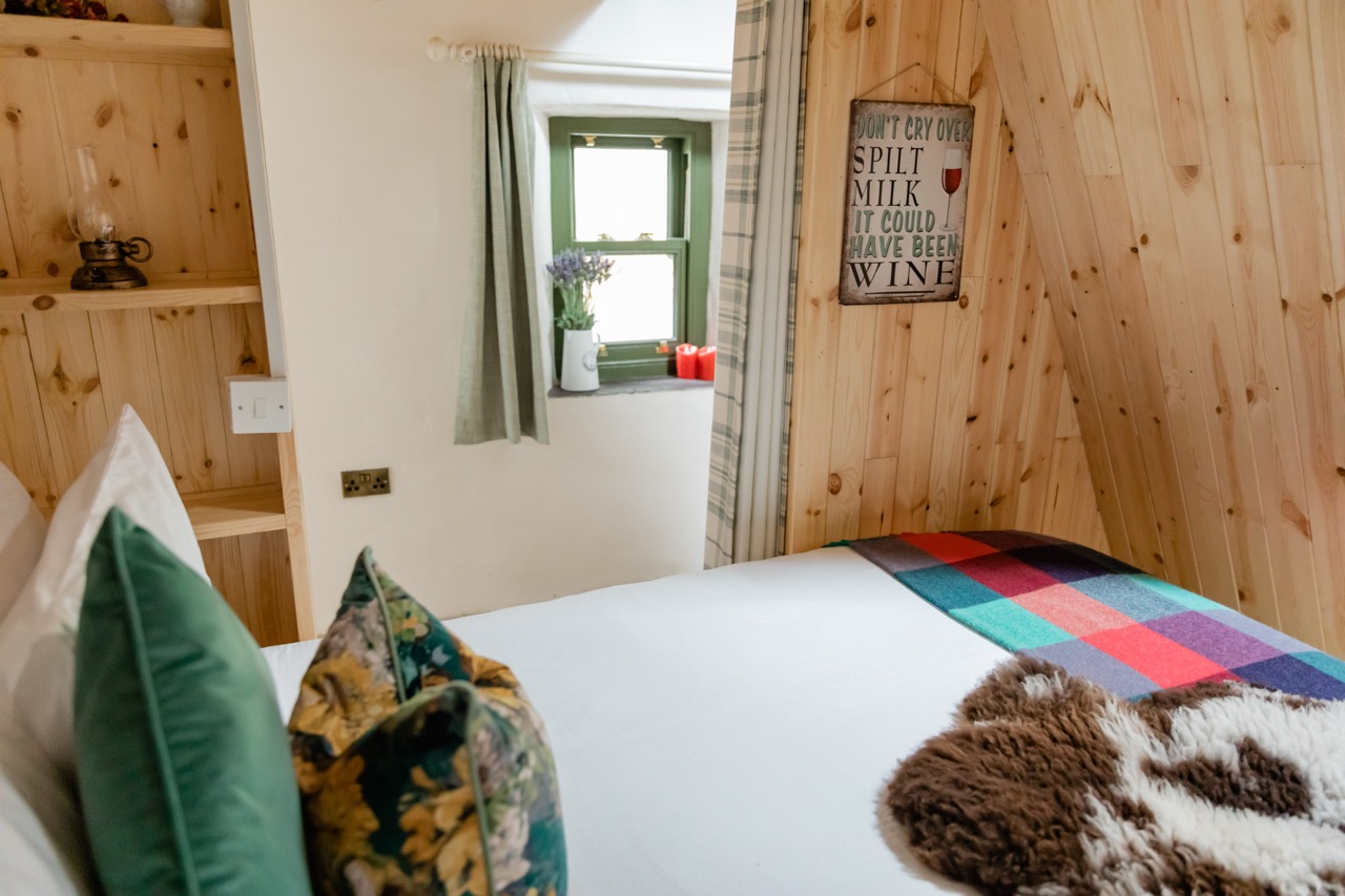 View of a bedroom with poster on the wall