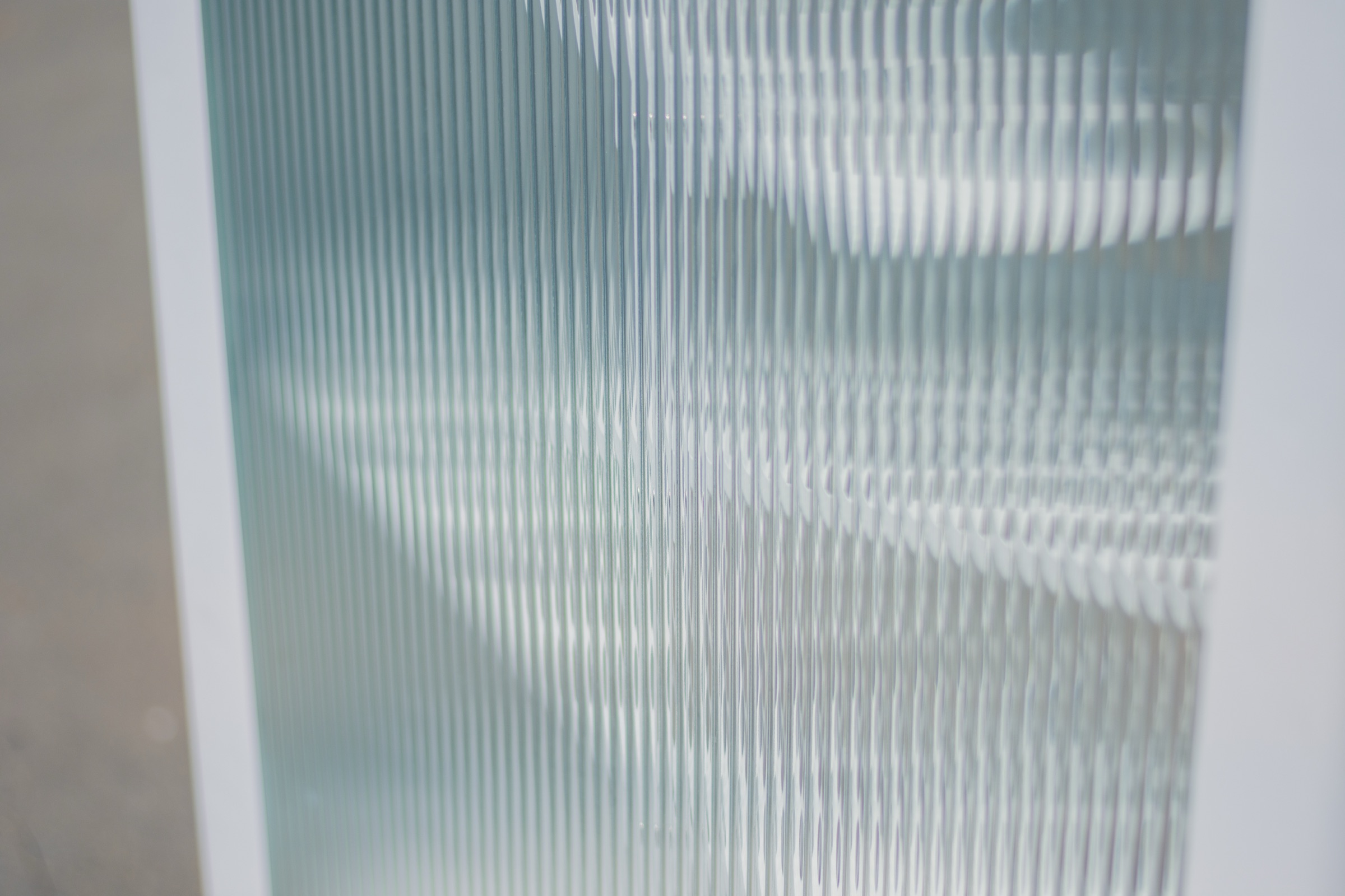Surface detail of the fluted glass panel