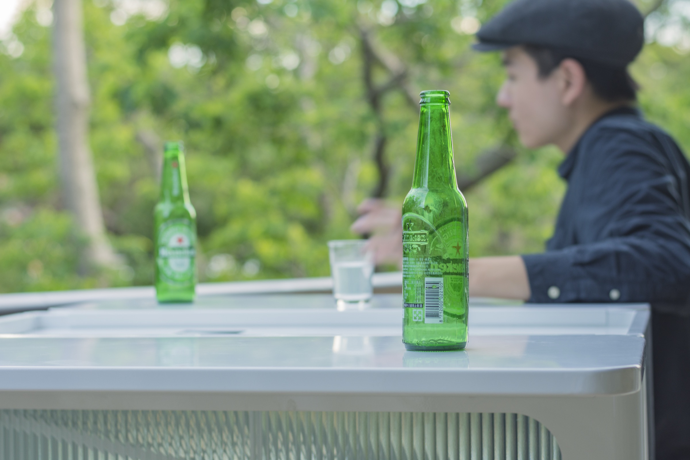The accompanying bar table with a glass base