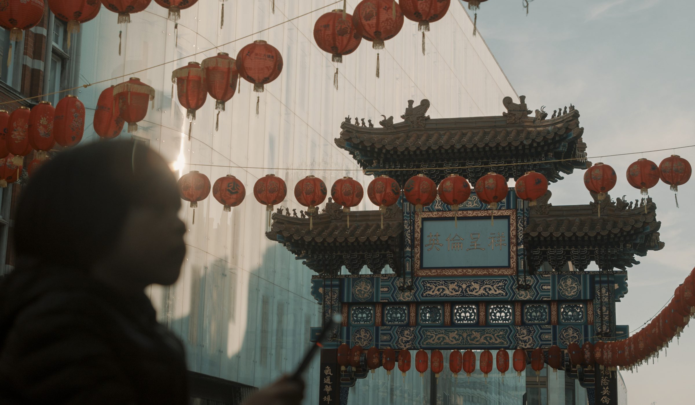 Red lanterns strung above the Chinatown gate in London