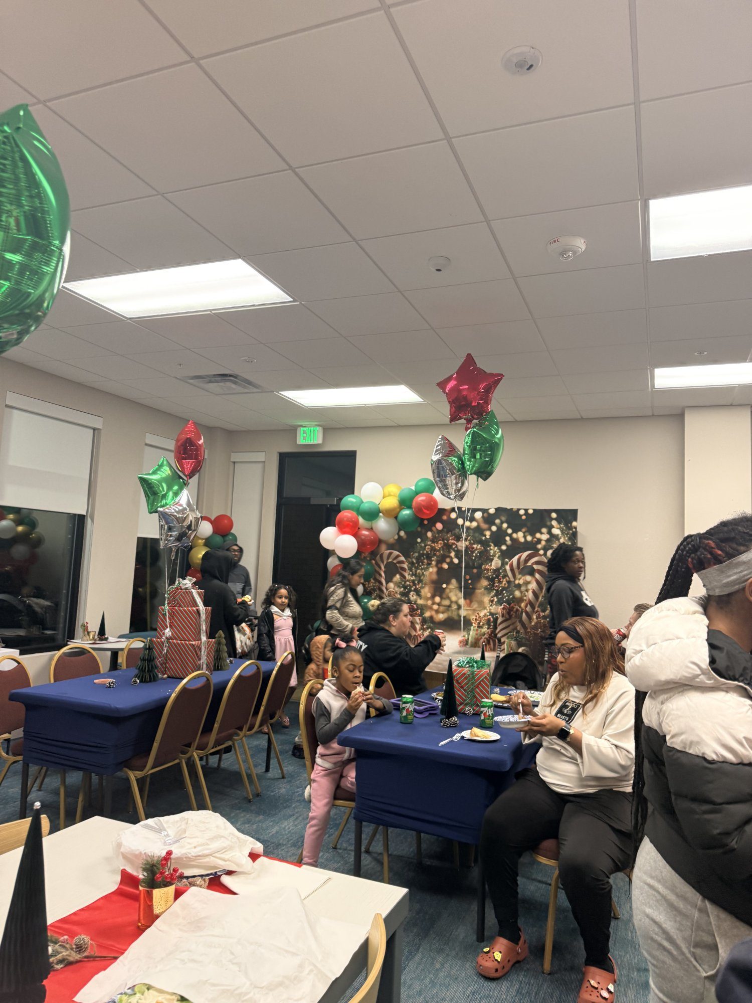 image of parents and staff discussing enrollment