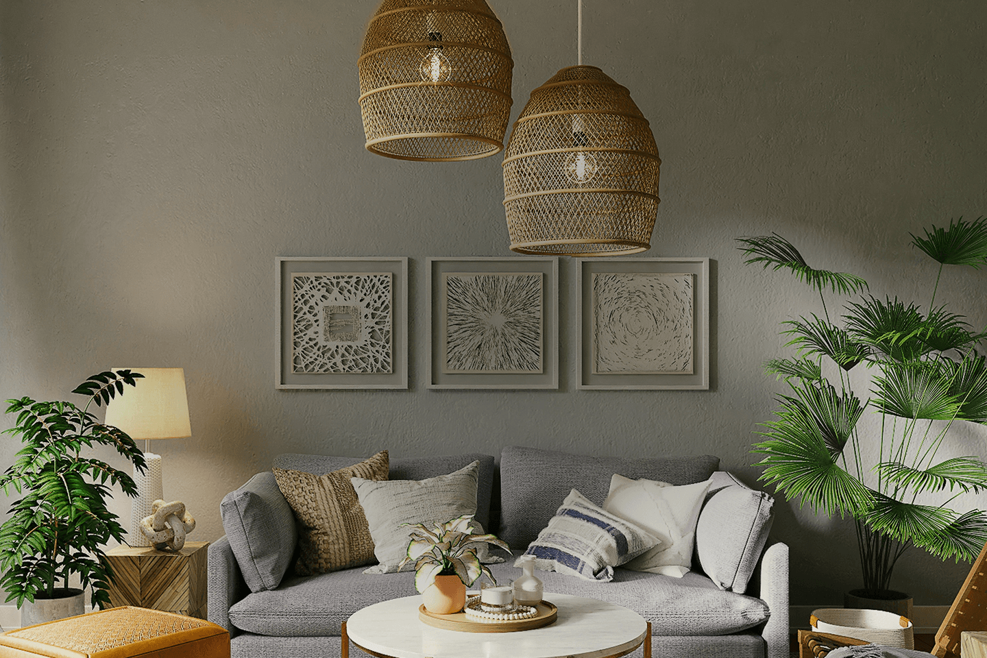 Cozy living room with a gray sofa adorned with assorted cushions, a round white coffee table with decor, two hanging woven lamps, framed abstract artwork on the wall, and green plants on either side.