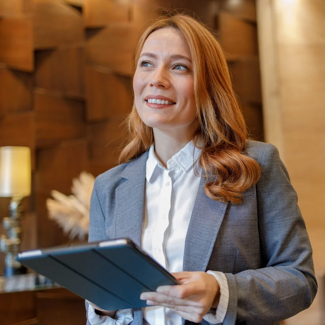 A business woman holding an iPad
