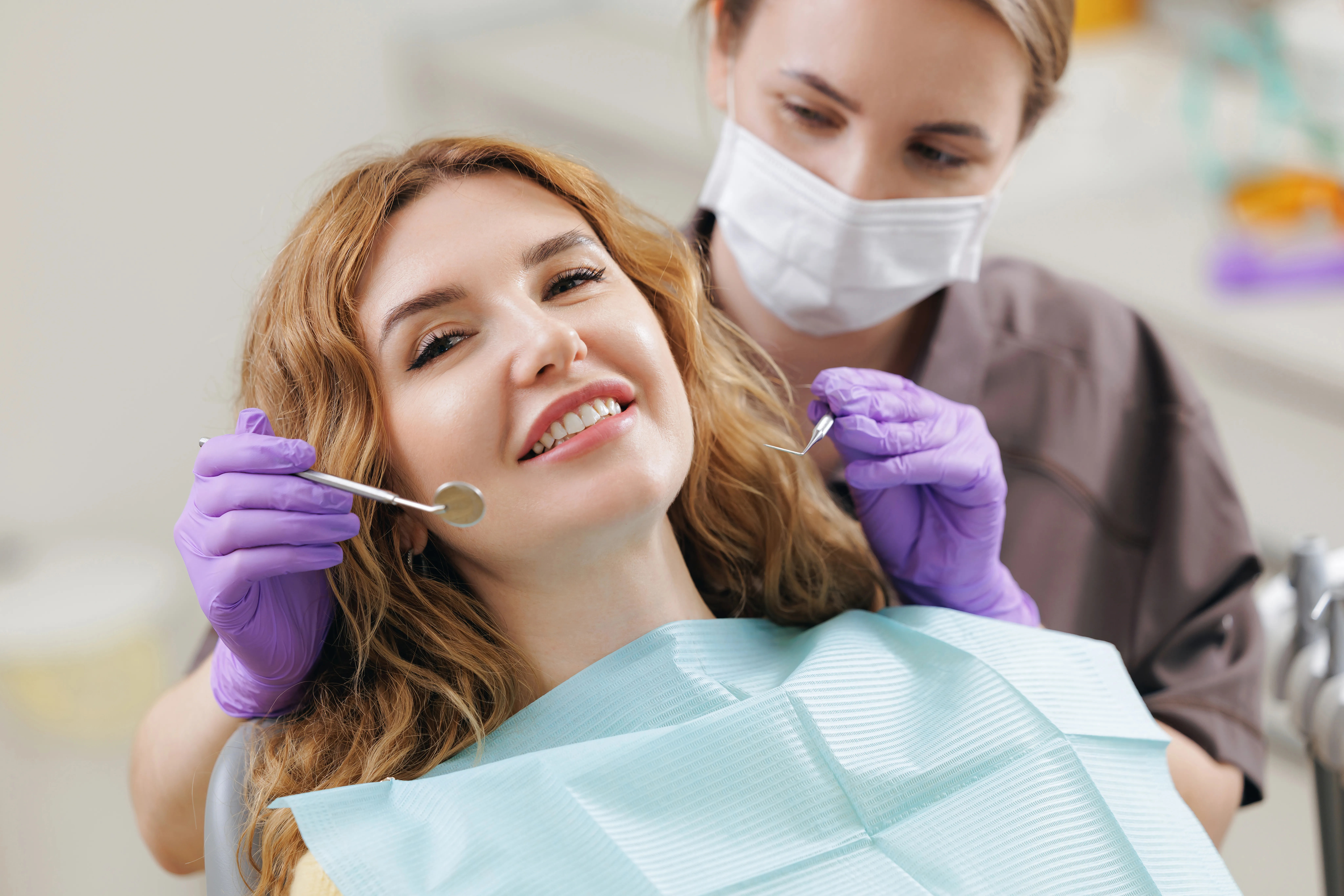 Adult patient smiling during a visit at the Markham Family Dental office