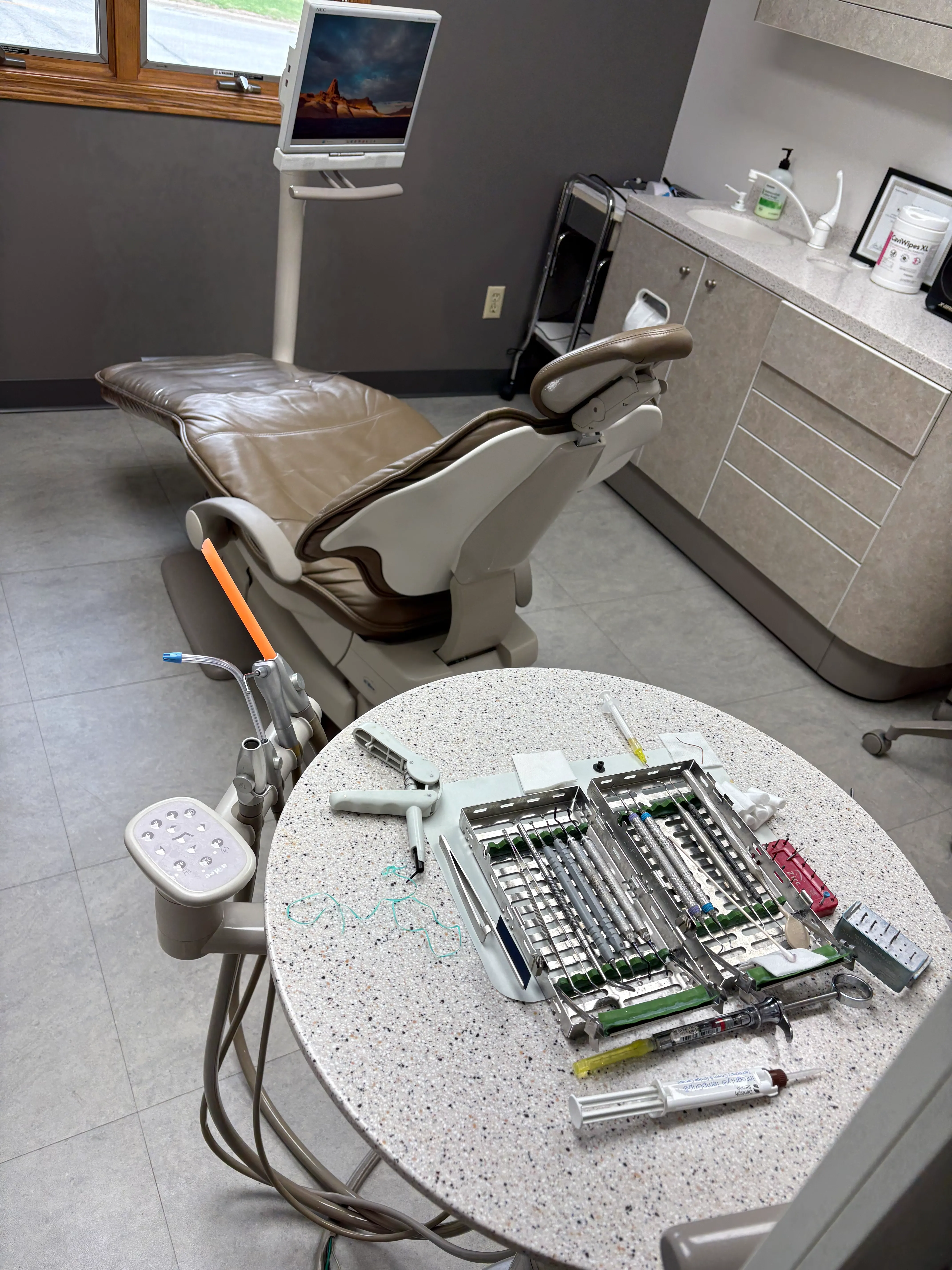 Modern dental treatment room with a chair