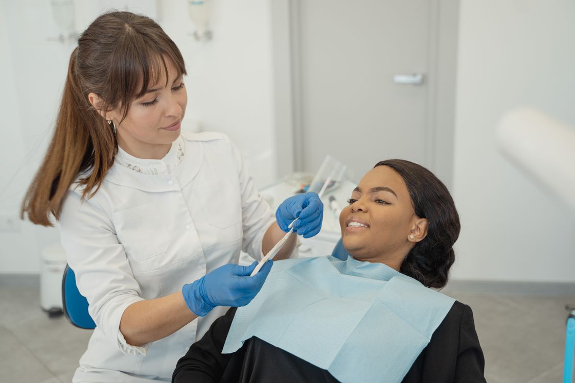 Dentist examining a patient during a routine dental checkup
