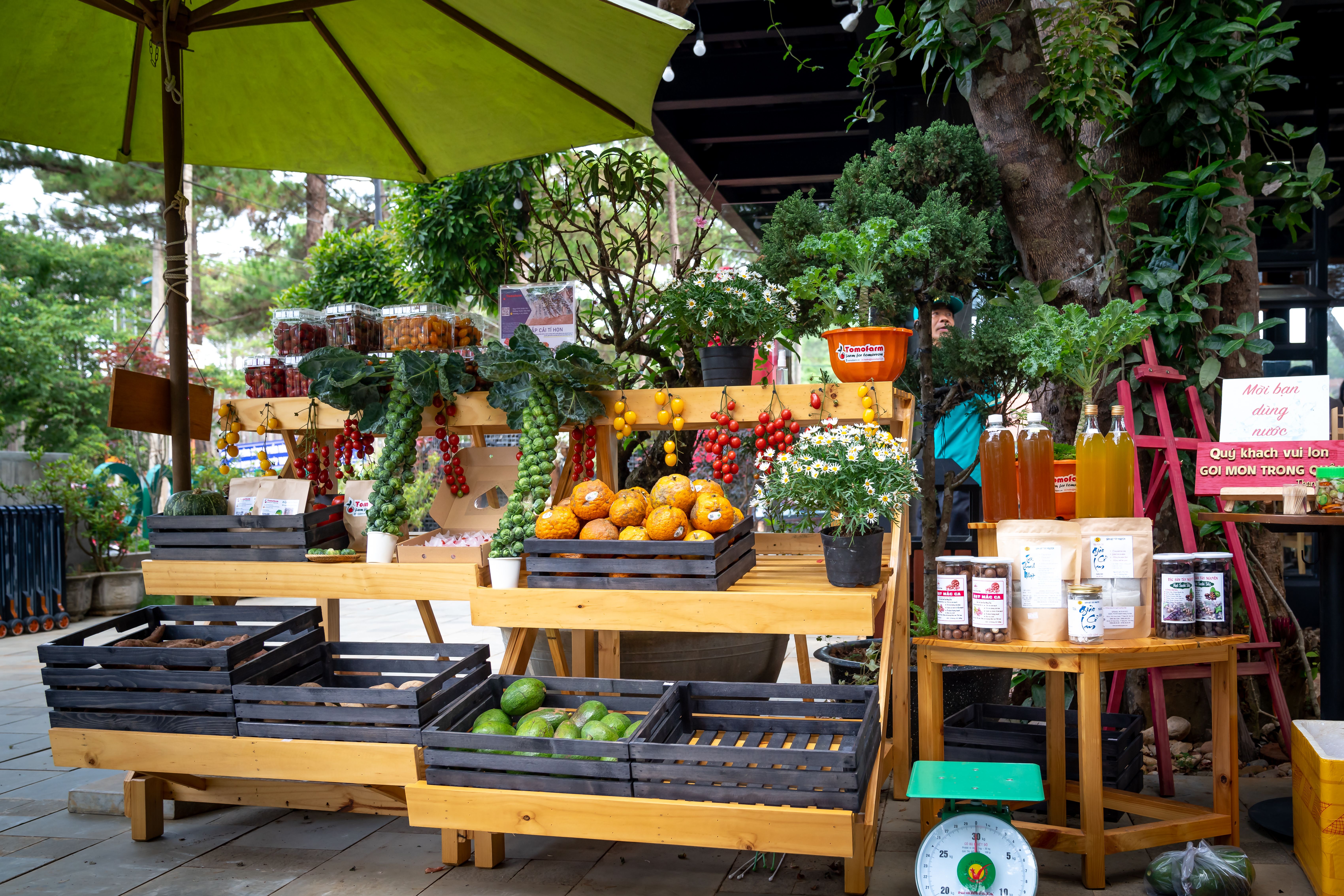 Fresh fruit and vegetables displayed at an outdoor market stall