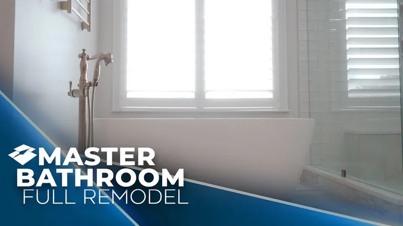 Freestanding tub with a brass telephone filler beside a shuttered window