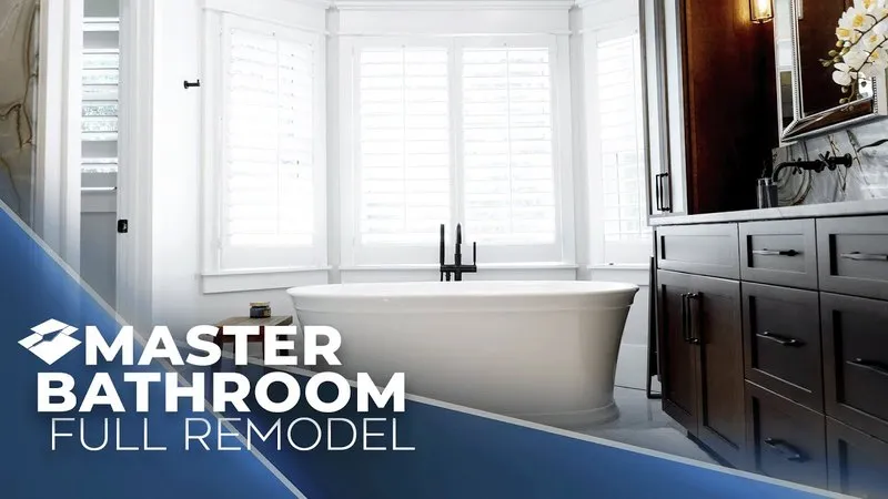 Bay window with shutters above a tub, dark vanity and a chandelier