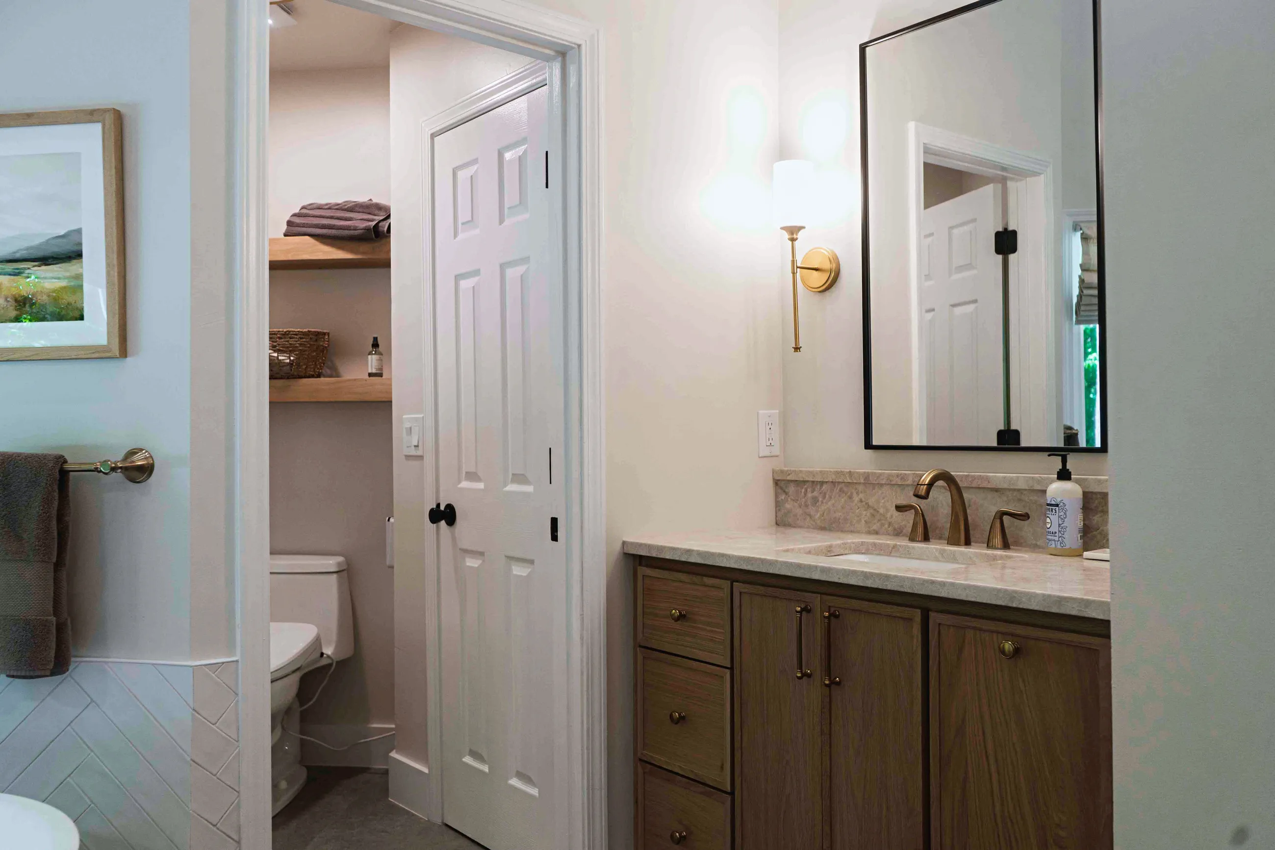 Custom vanity and tile work in a finished master bathroom