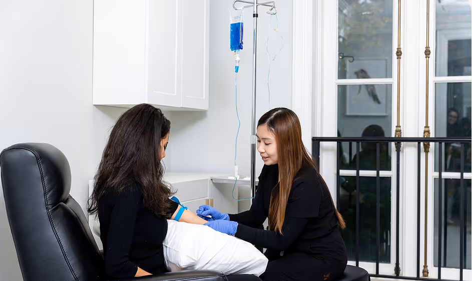 Medical professional performing a health assessment on a patient in a clinic