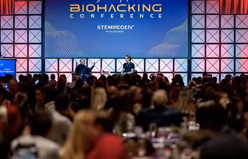 Attendees gathered at a biohacking conference