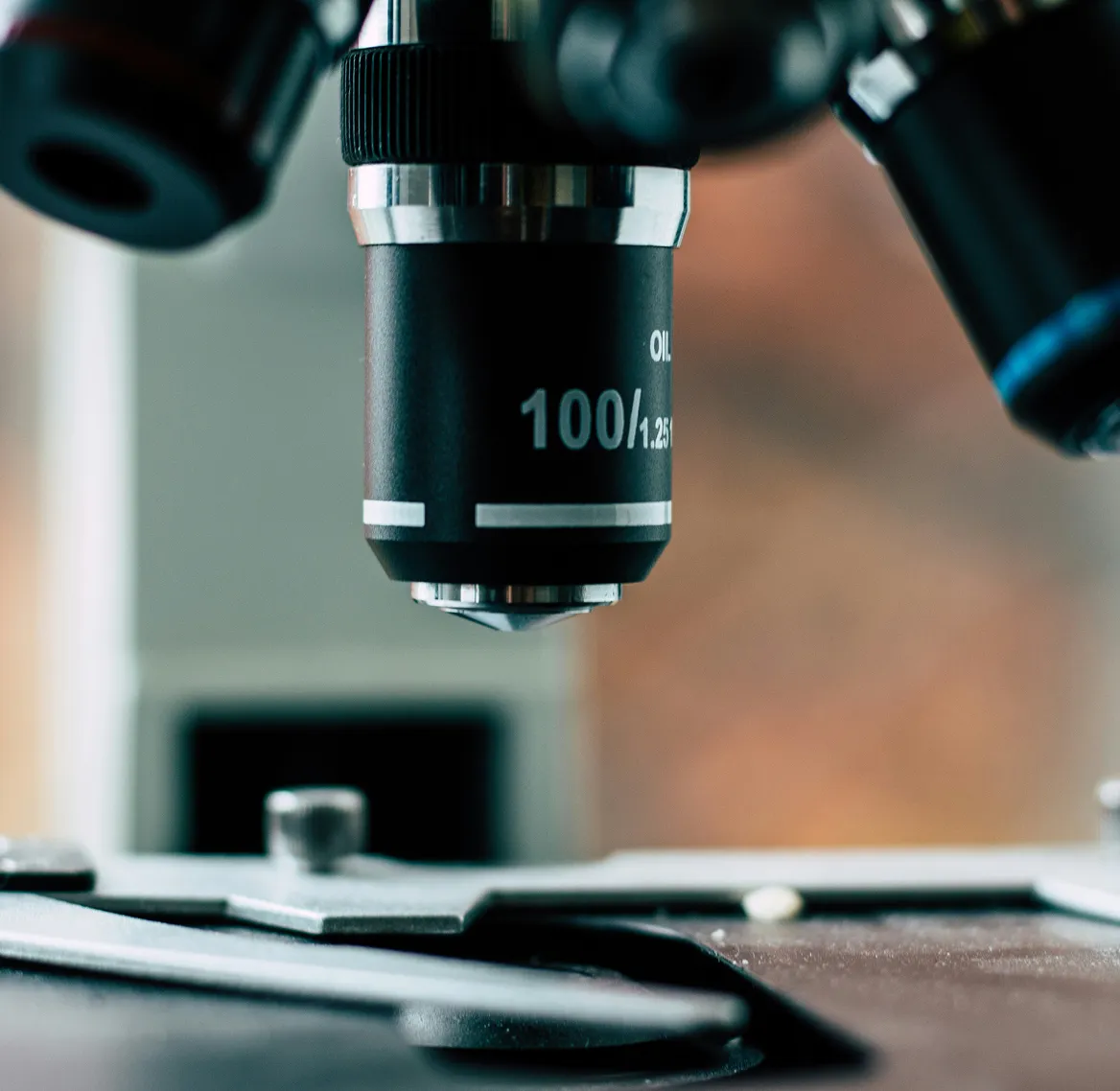 Close-up of a laboratory microscope lens for comprehensive health testing