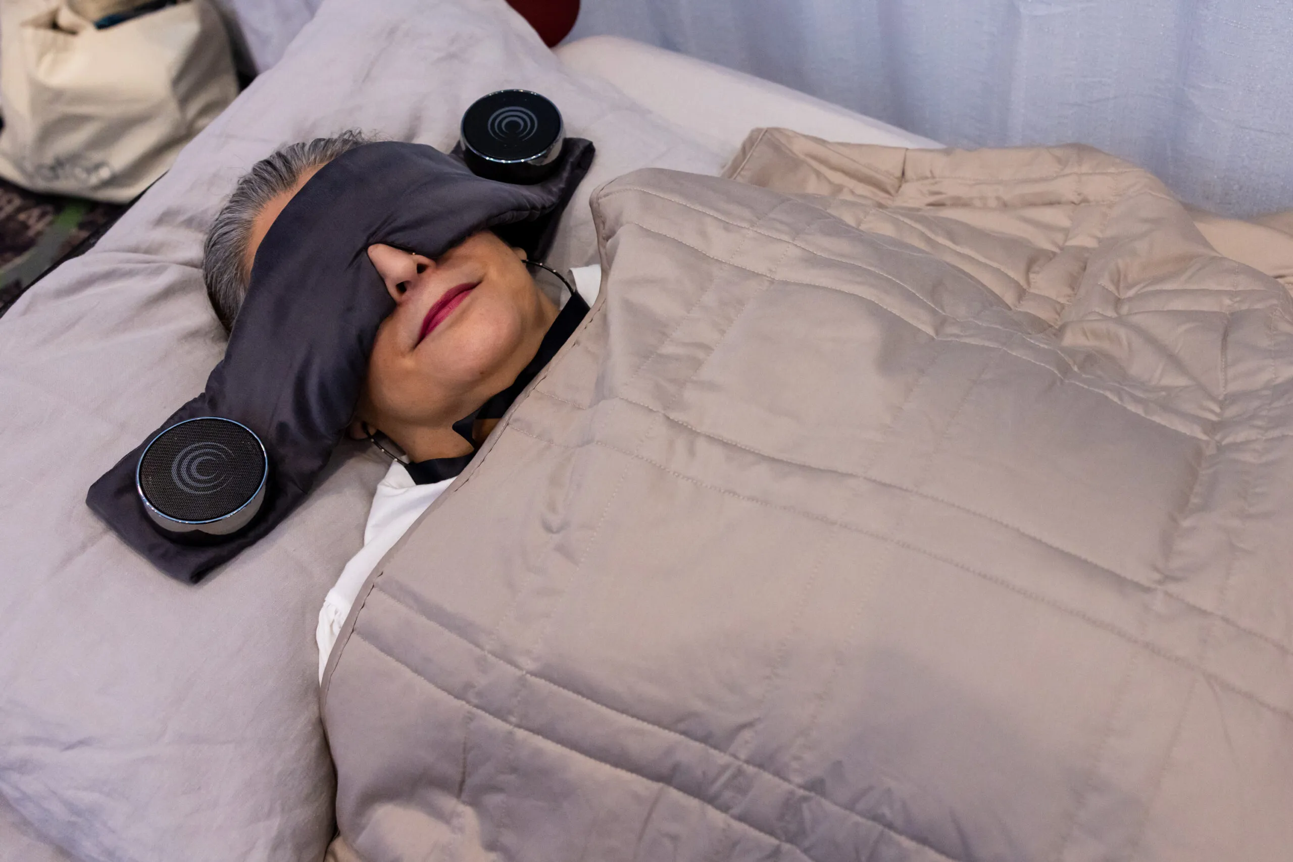 Person wearing a neurofeedback headset during a brain training session