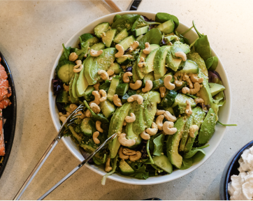 Healthy grain and vegetable bowl with mixed greens