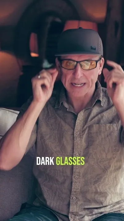 Dave Asprey wearing dark glasses in a biohacking video