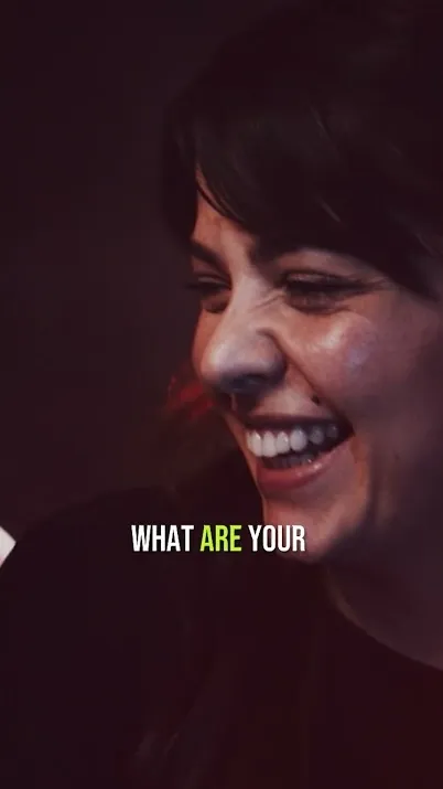 Woman smiling in a video about wellness and fulfillment