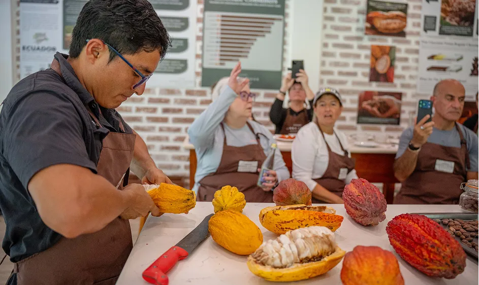 Chef preparing traditional cuisine during a cooking class with participants You said: for these as well