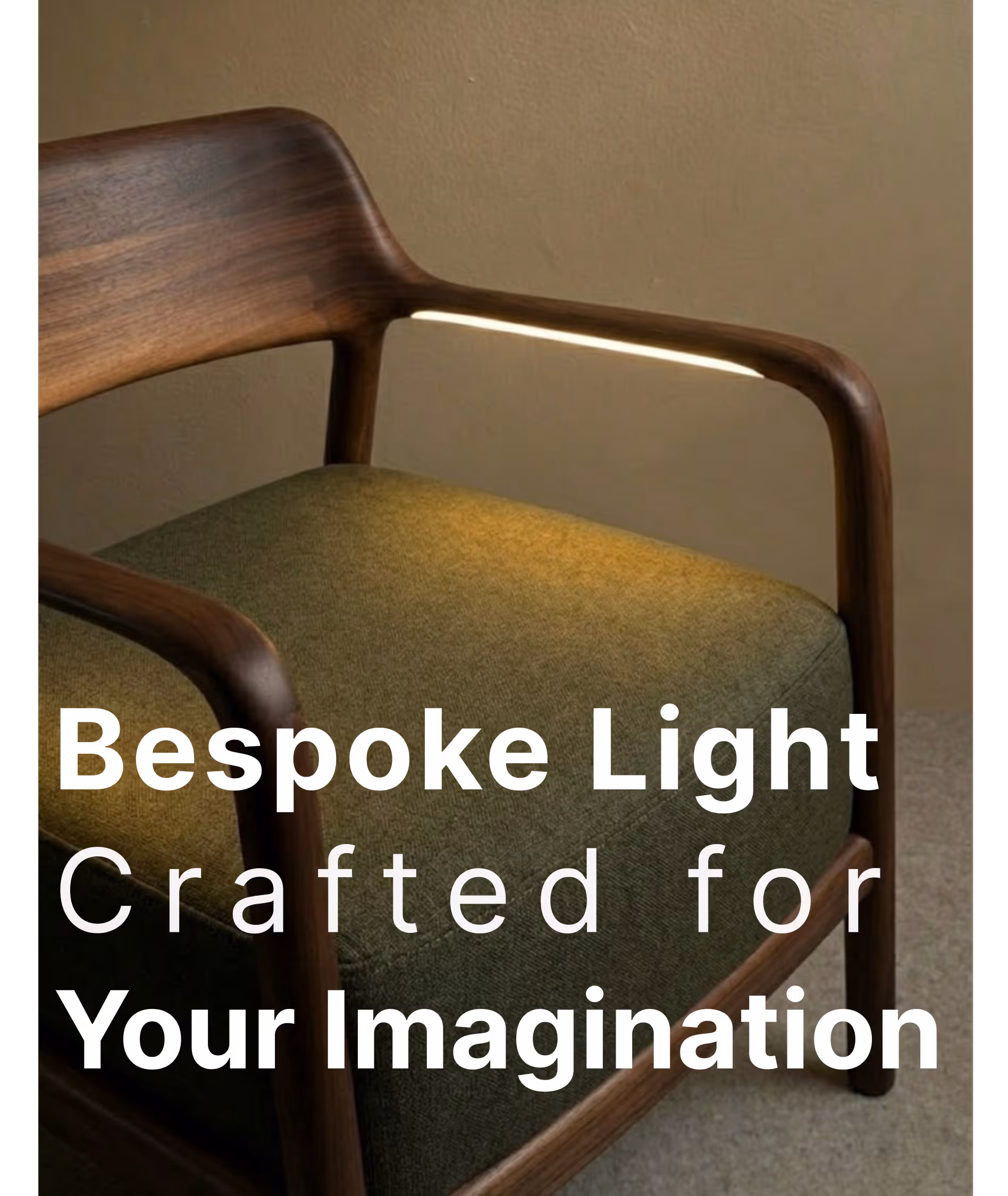 Modern wooden chair with green cushion and integrated bespoke light on armrest.