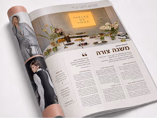Open fashion magazine spread with images of two models and a table of desserts under a Parlez De Vous sign.