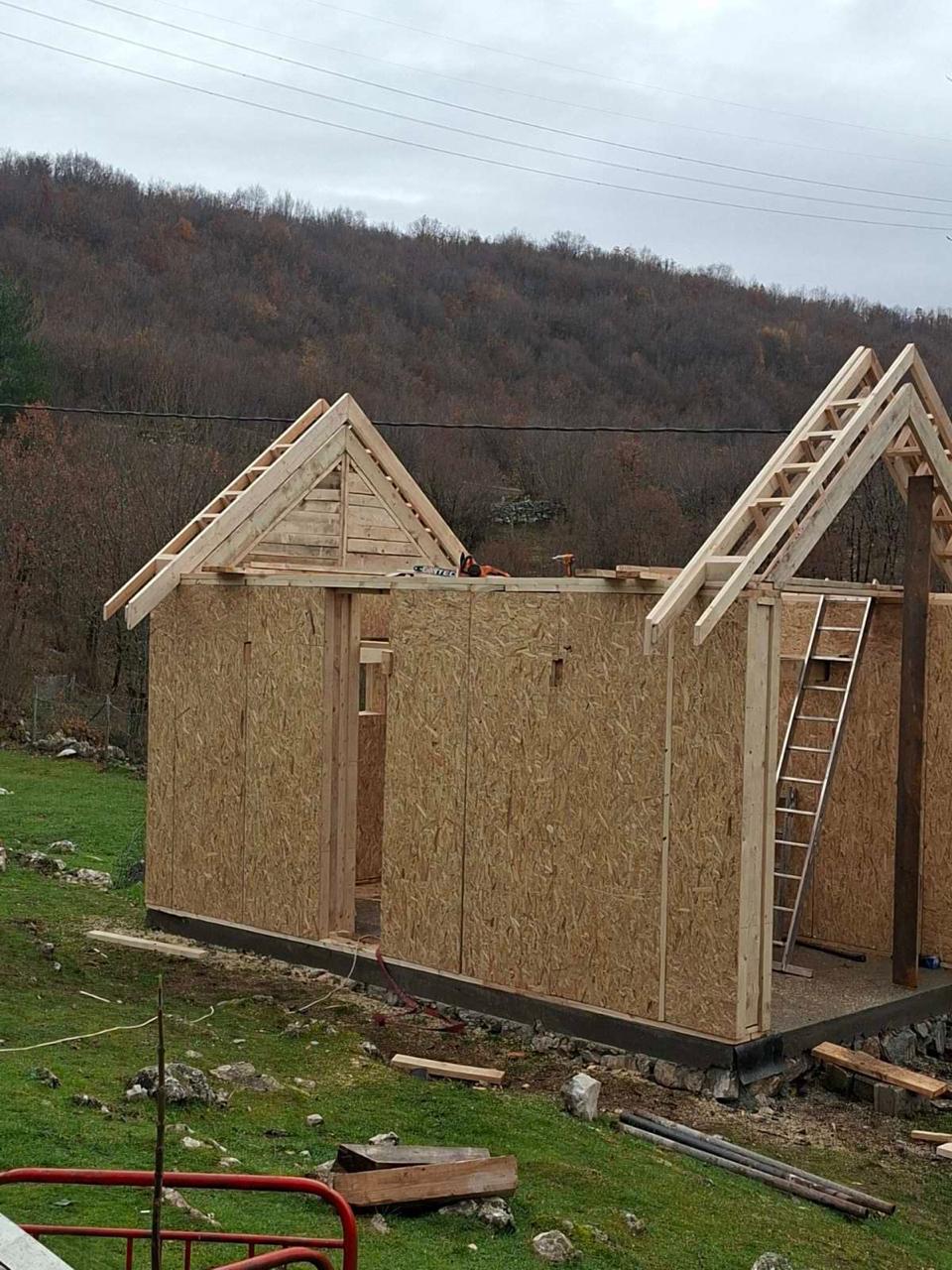 Wall assembly, sheathing and the start of roof work