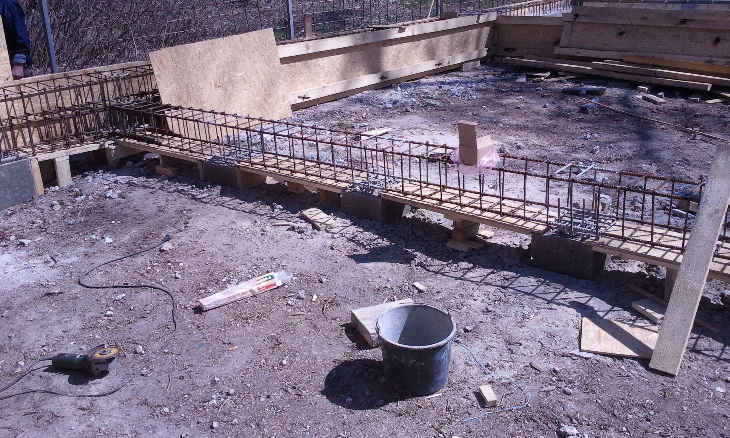 Formwork and reinforcement of a strip foundation on site