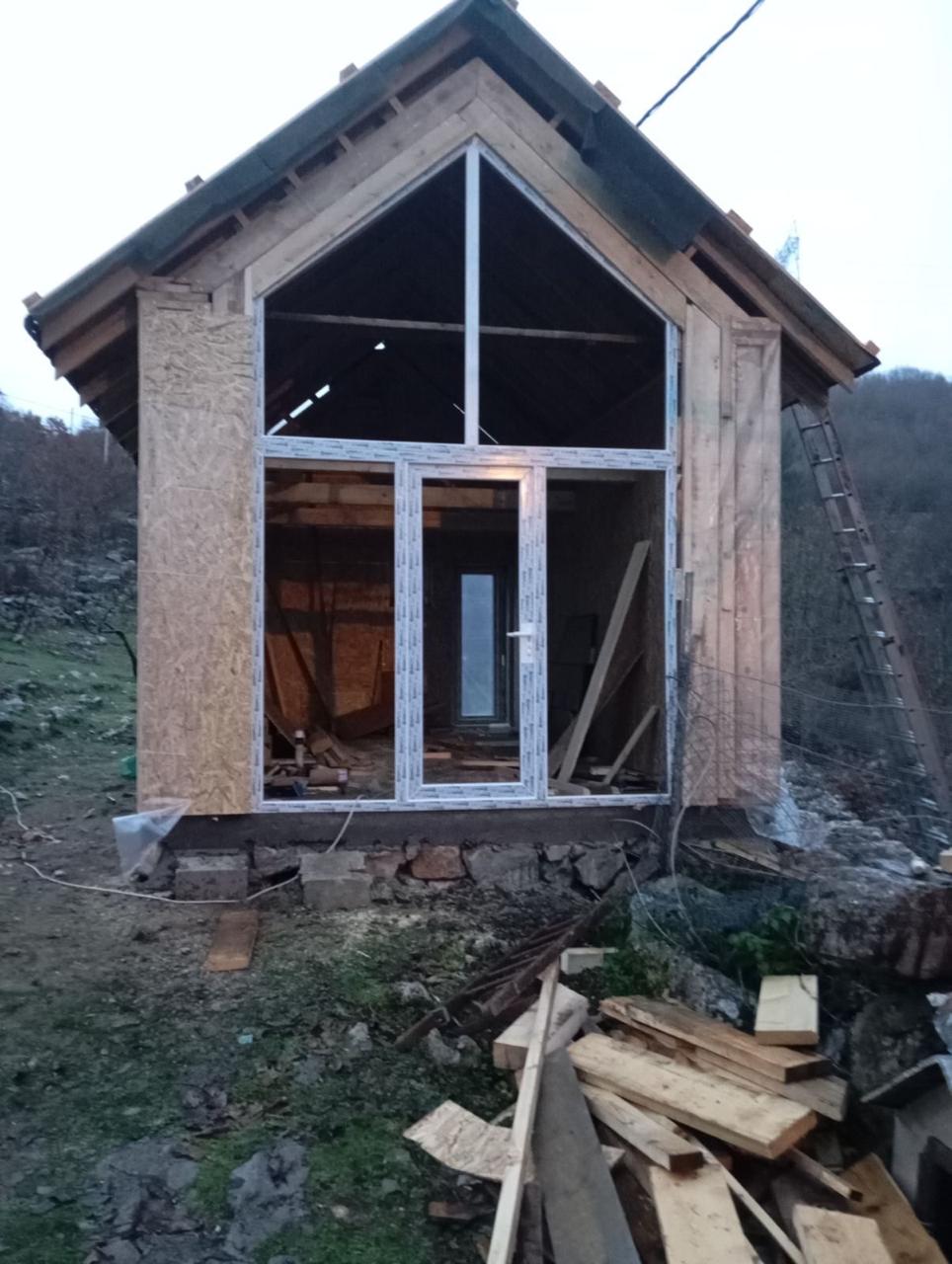 Facade Cladding and Window Installation
