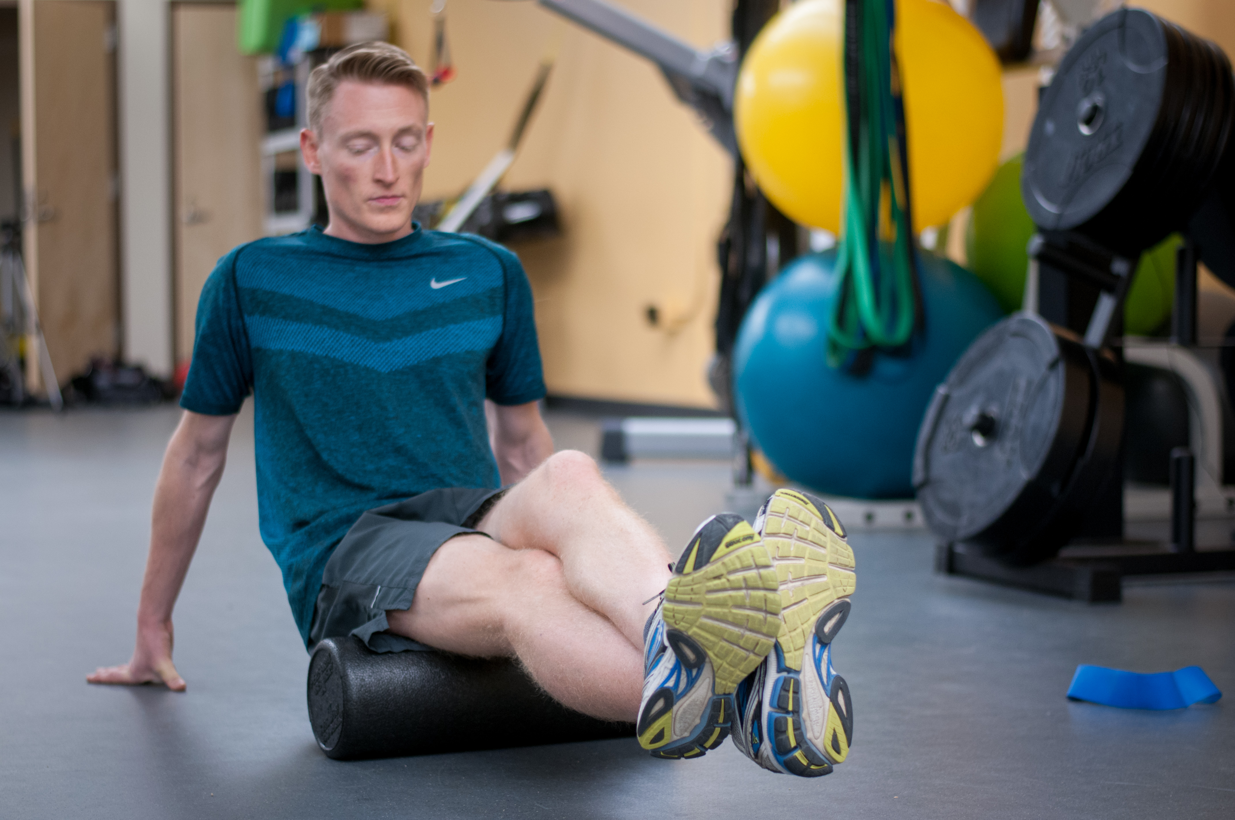 image of a personal trainer guiding a client through a workout