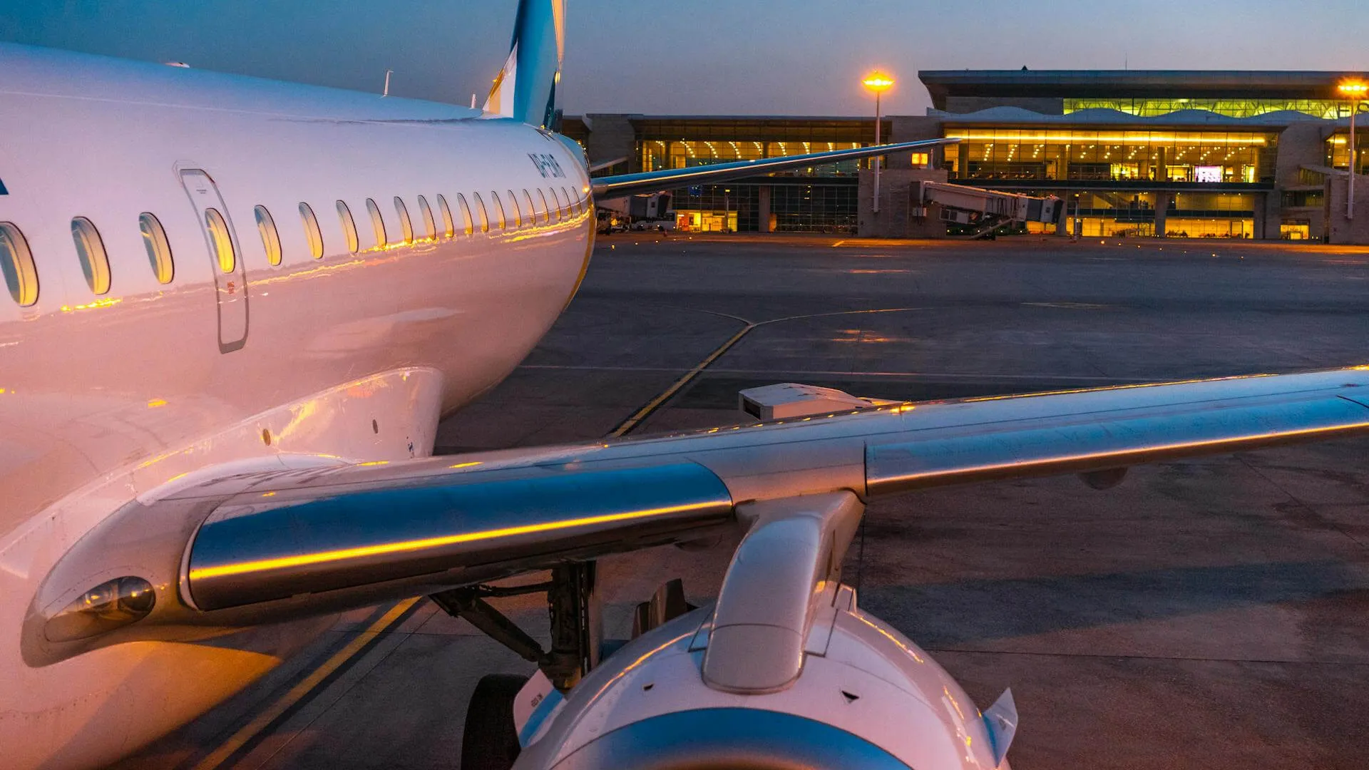 closeup of an airplane on an airport at dusk