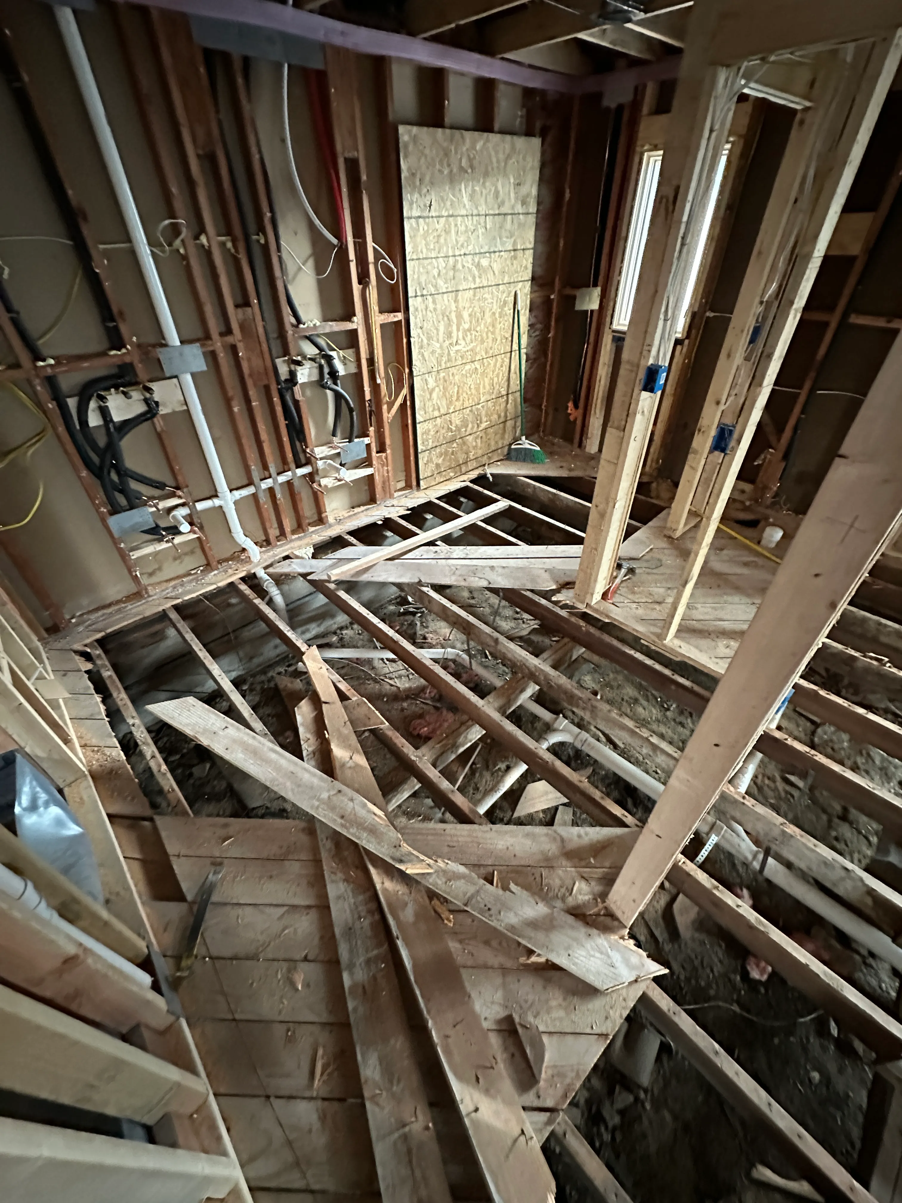 Framing and plumbing rough-in over the crawlspace