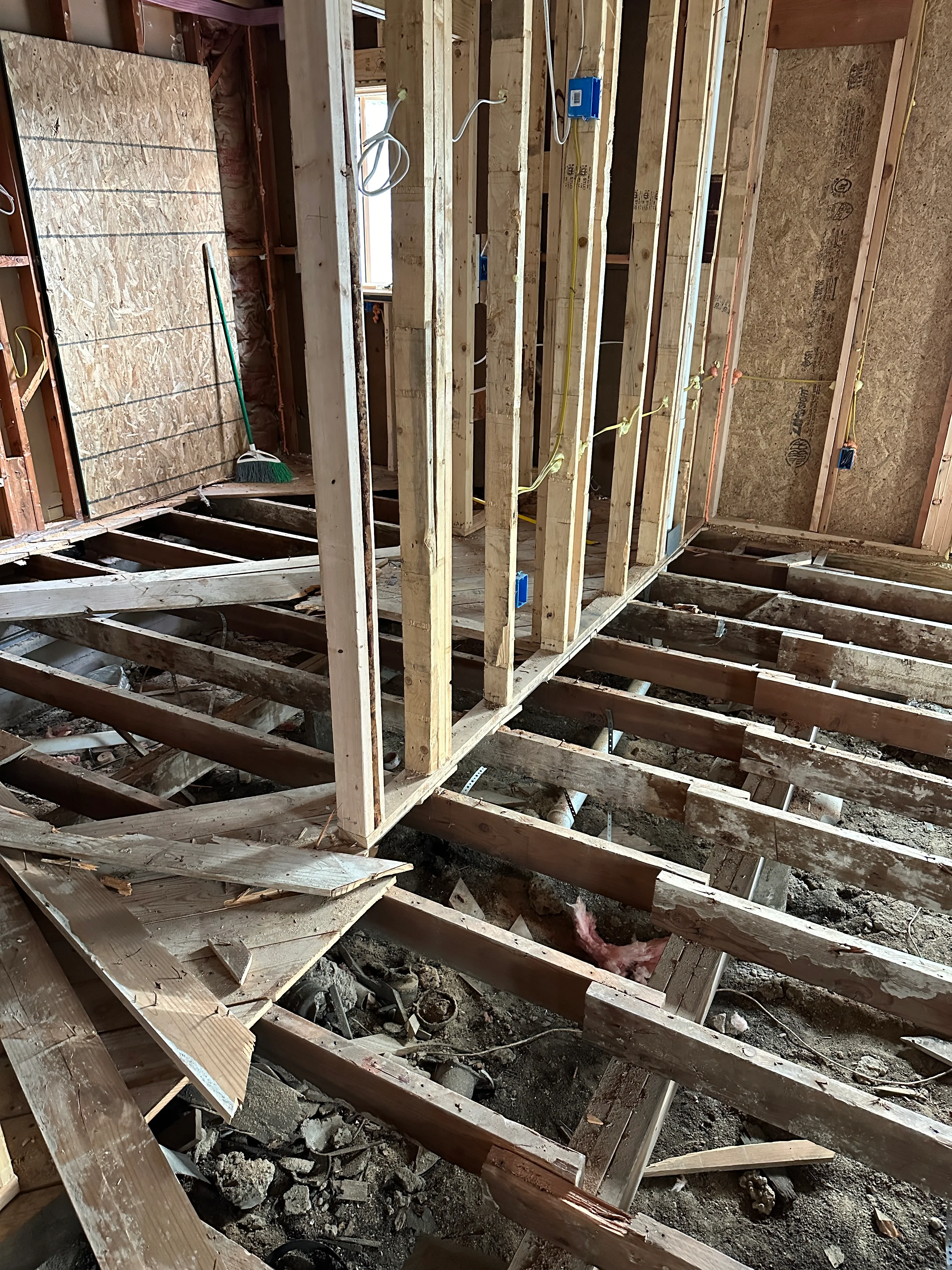 Structural framing and subfloor during reconstruction