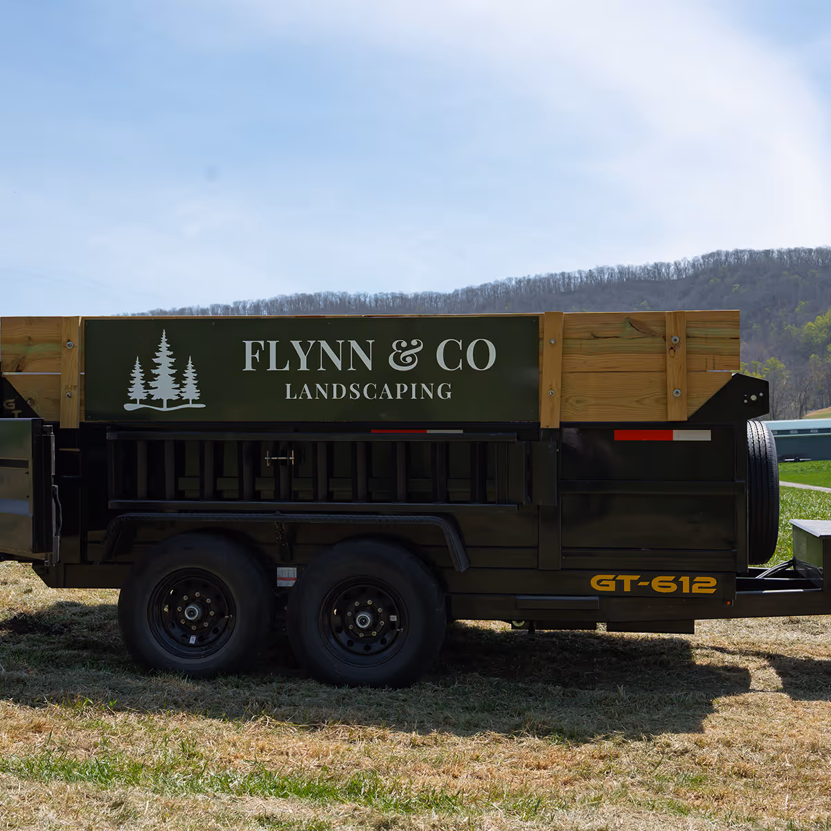 Flynn and Co Landscaping trailer and professional equipment setup ready for landscape projects