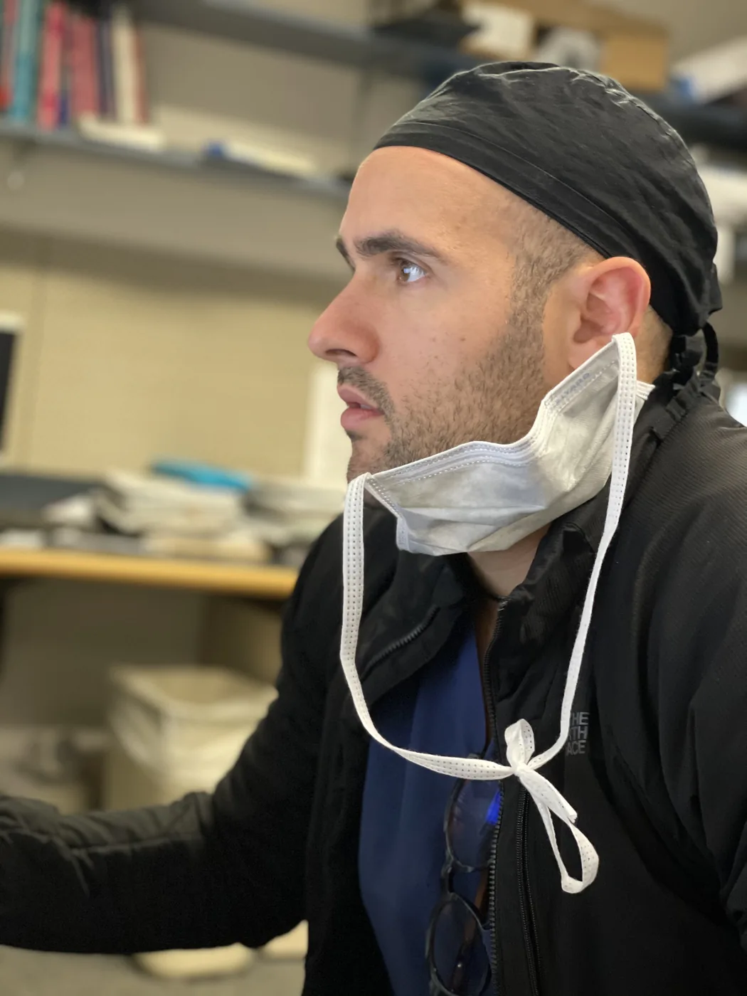 Dr. Michael Grinn in surgical cap during a cardiac case