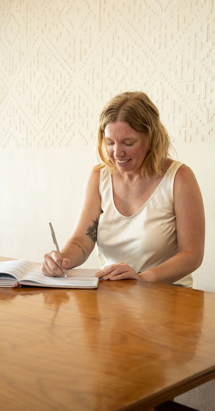 Rebecca Nash, fractional Director of Operations, planning at her desk.