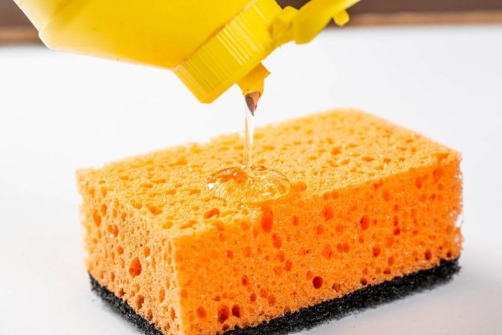 How do professional window washers clean windows?