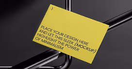 Yellow card with placeholder text hanging on a minimalist black metal structure against a dark background.