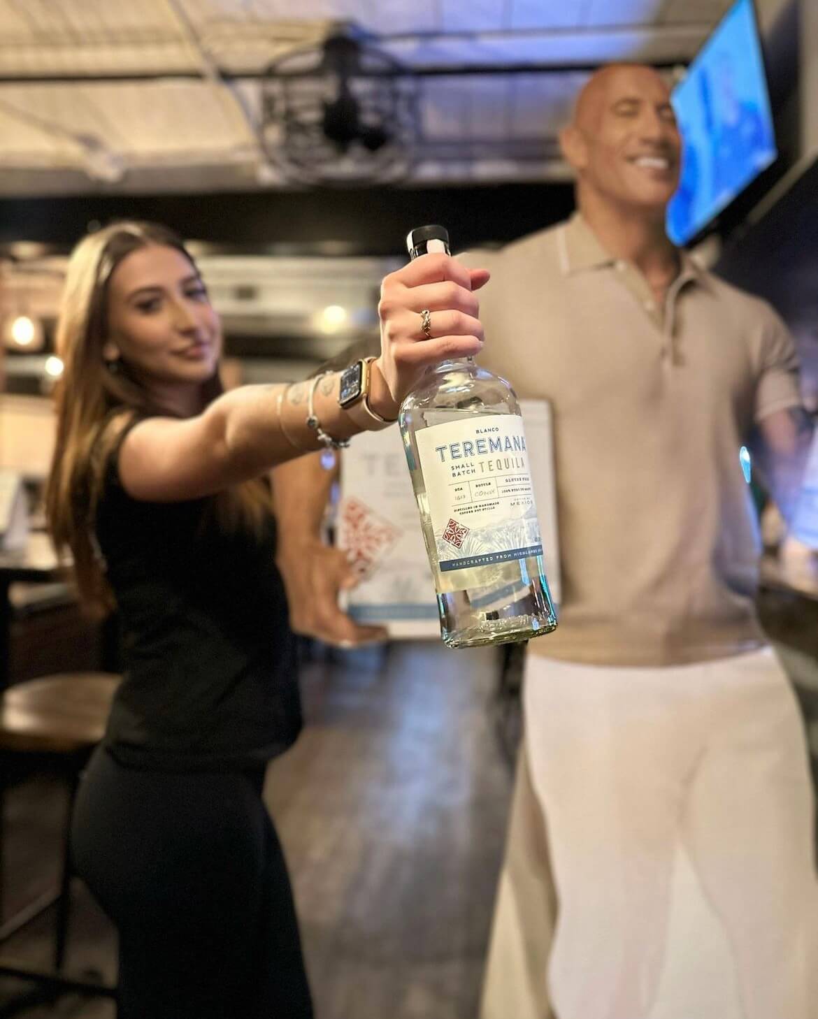 woman holding teremana