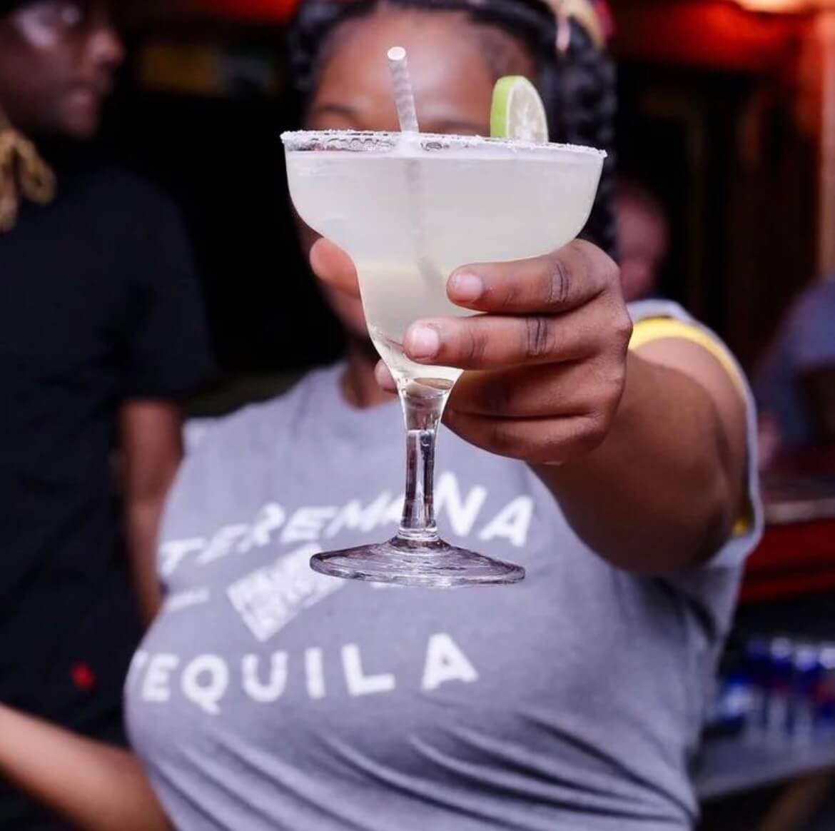 person with cocktail