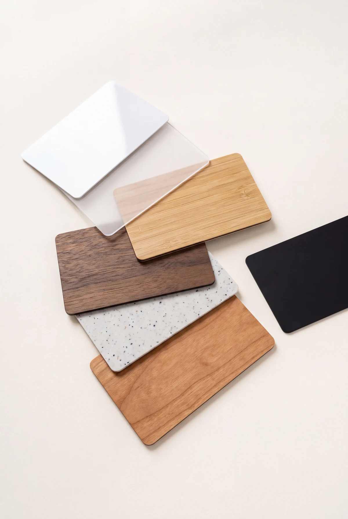 Blank cards in white PVC, recycled PVC, bamboo, cherry and black walnut