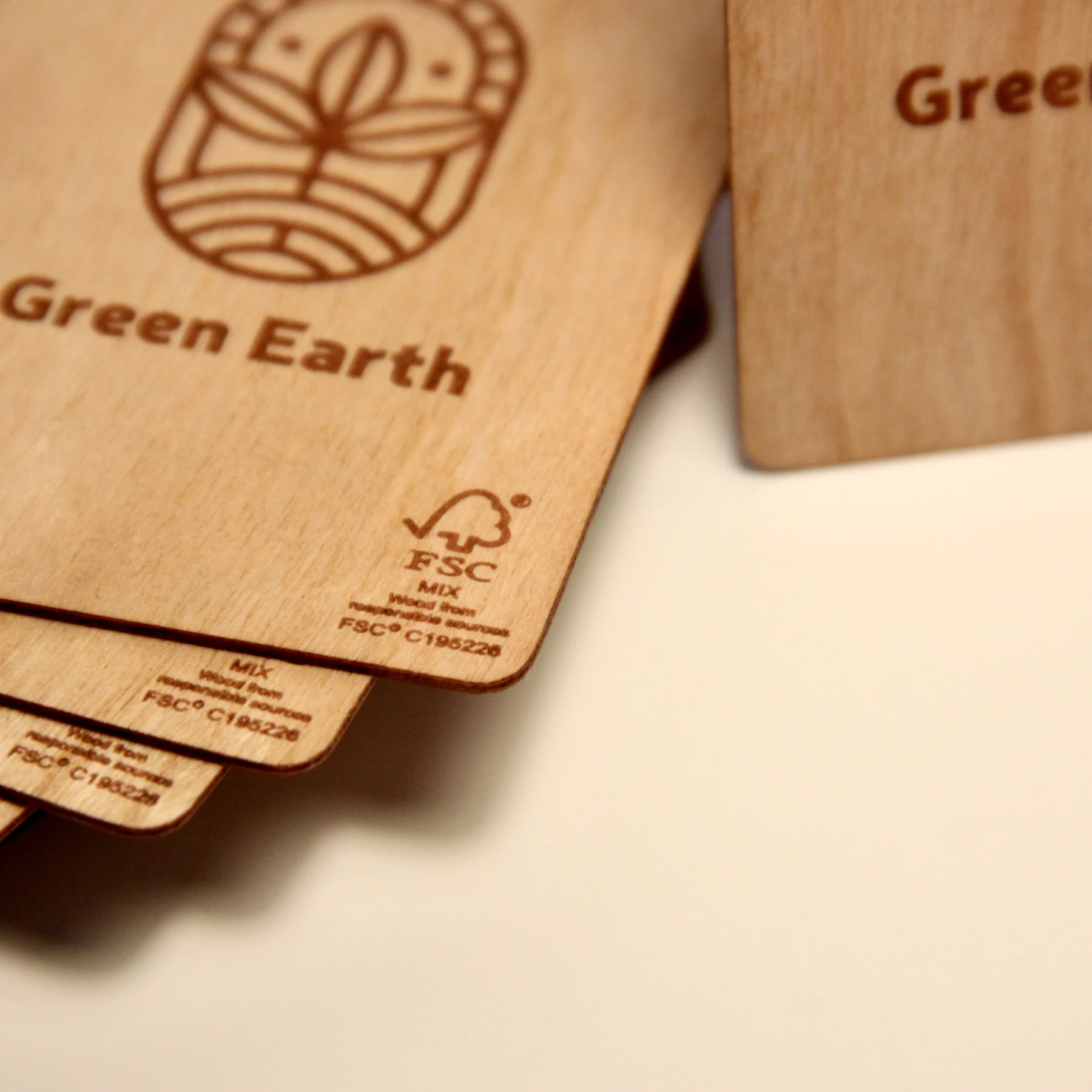 Wooden cards engraved with the FSC mix mark and licence number