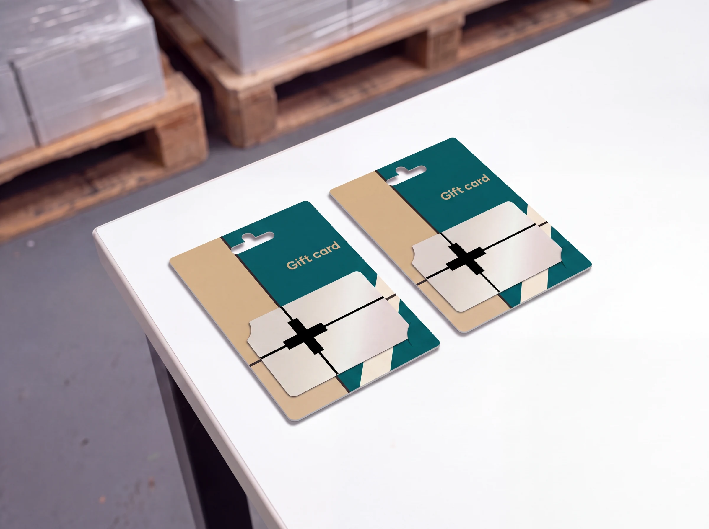 A gift card seated in its printed hanging carrier, card and carrier from one artwork file