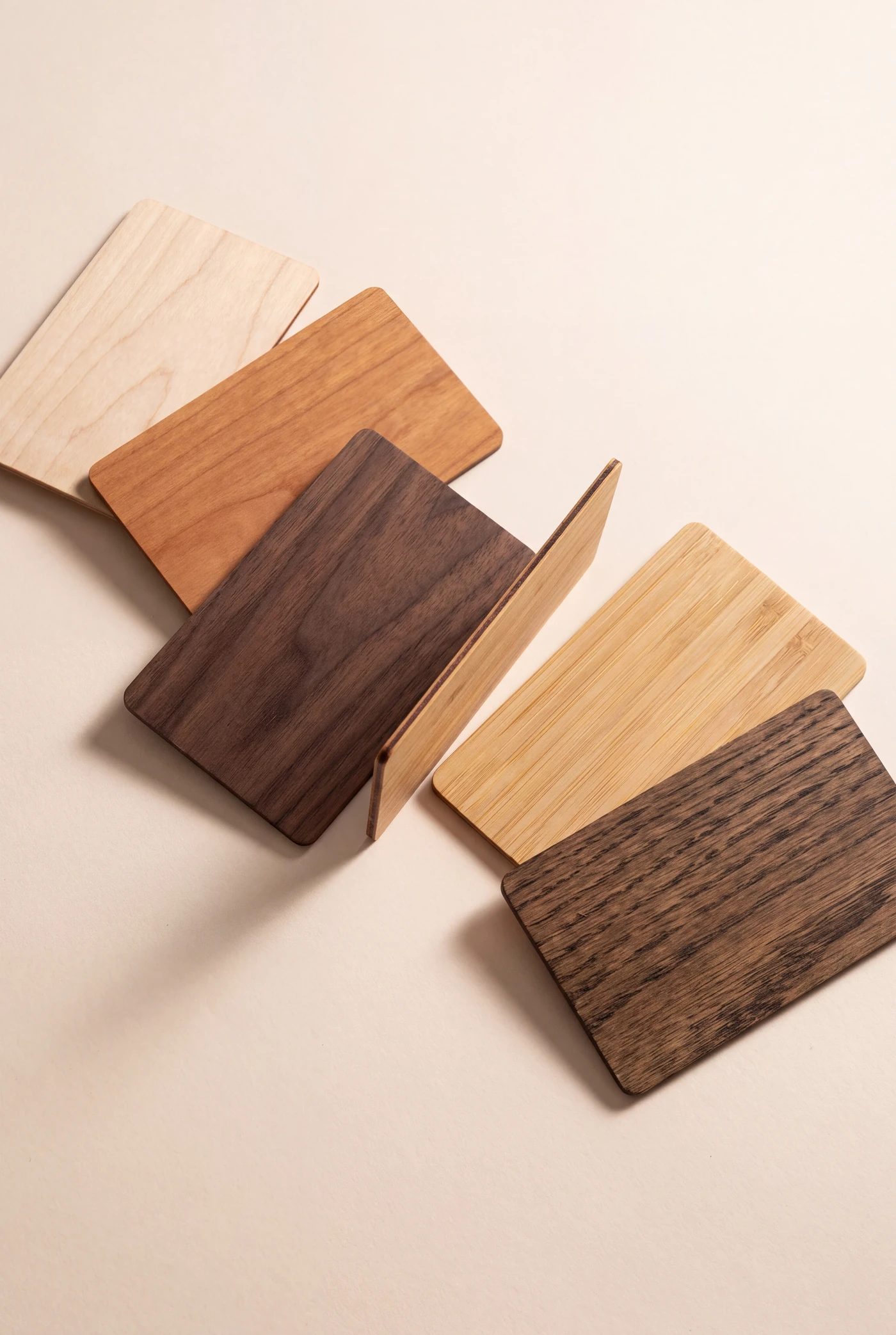 Blank wooden cards in basswood, cherry, black walnut, bamboo and stained oak