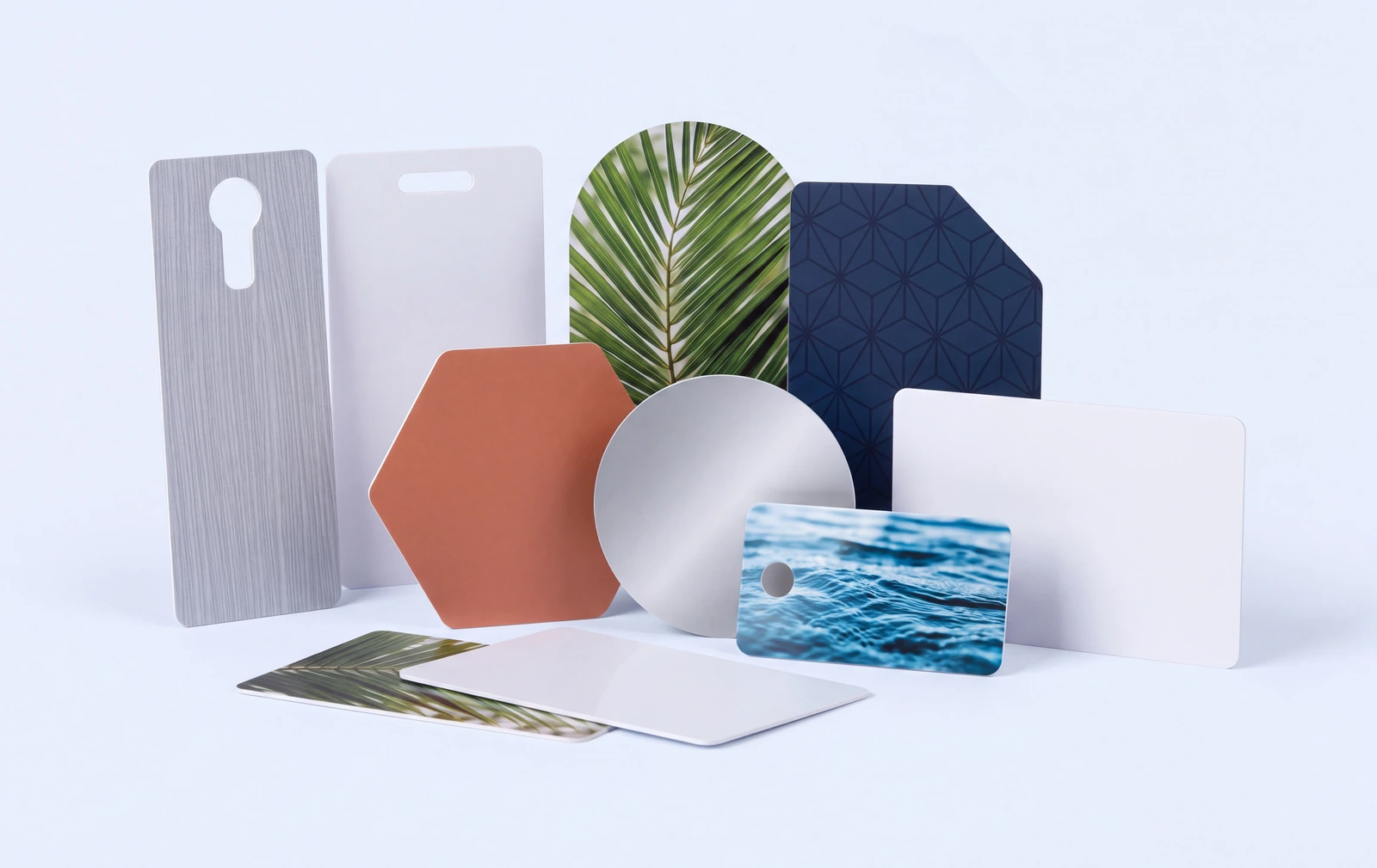 Cards cut to non standard shapes: hexagon, circle, stadium, angled corner and a slotted tag, printed and blank