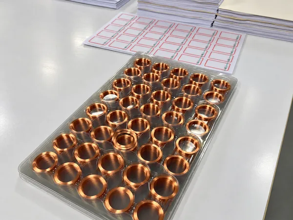 Tray of copper RFID antenna coils