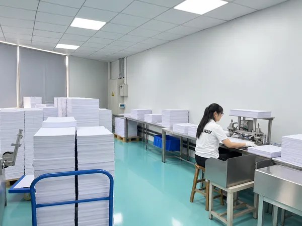 Finishing room with stacks of card sheets
