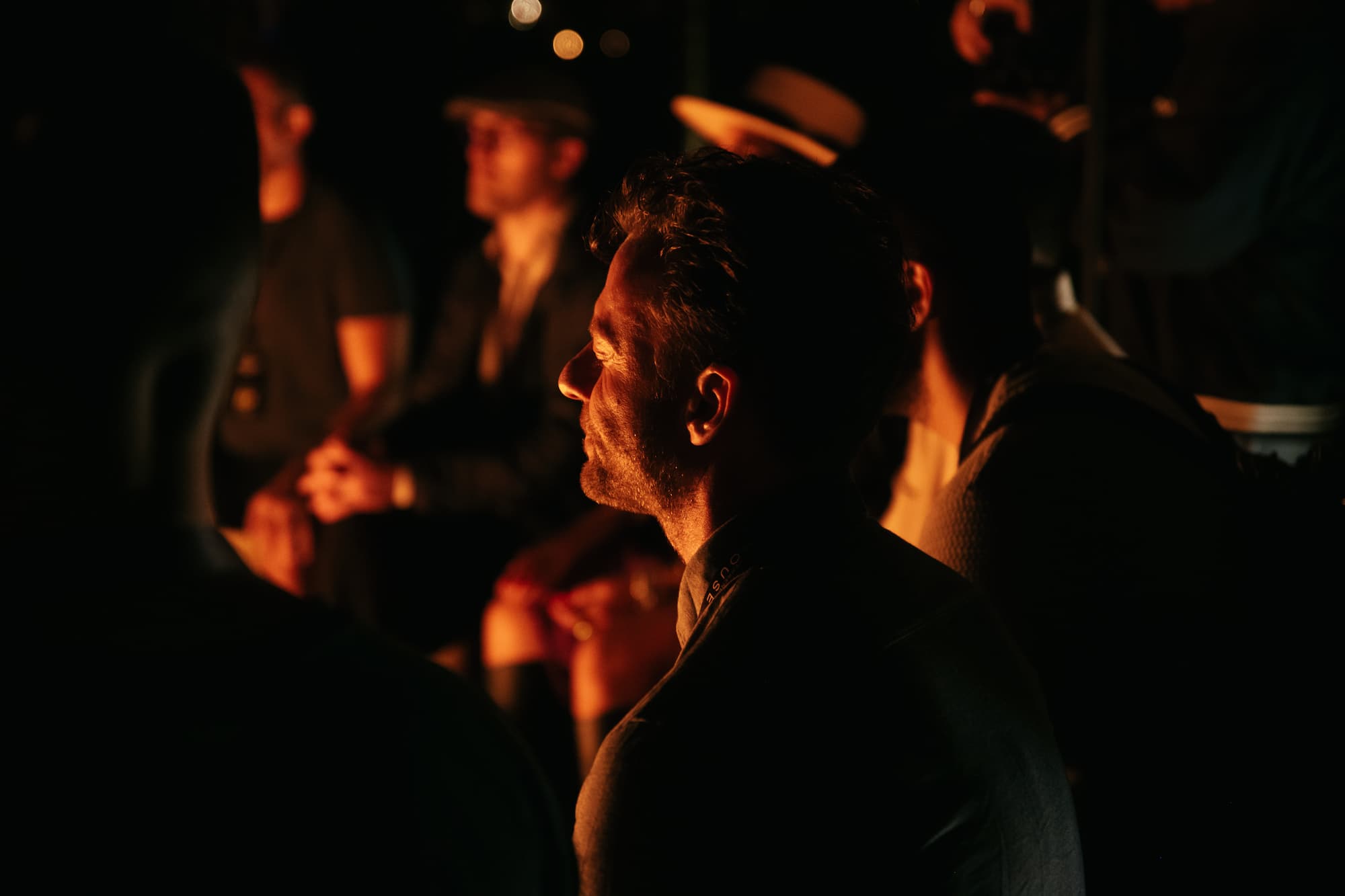 Founders around the fire at the 72 Hours Off Grid retreat, Guatapé