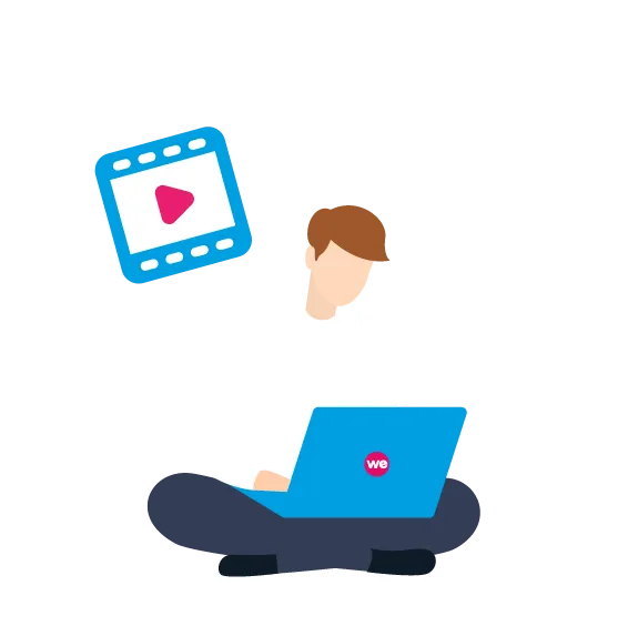 Person sitting cross-legged with a laptop showing 'we' and a floating video clip icon.