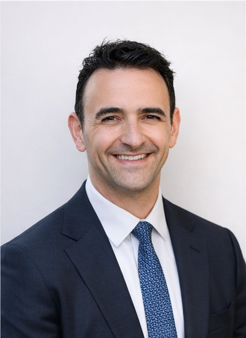 Joe Maurici, CA Director of Vitas Advisory, smiling on a studio portrait