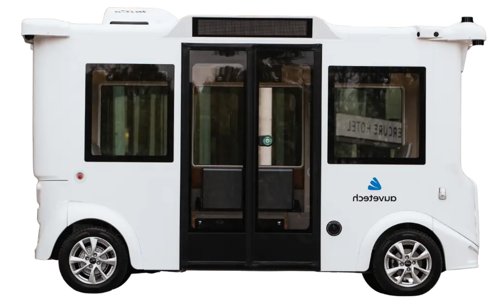 Side view of a compact white autonomous shuttle bus with auvetech logo and large windows.
